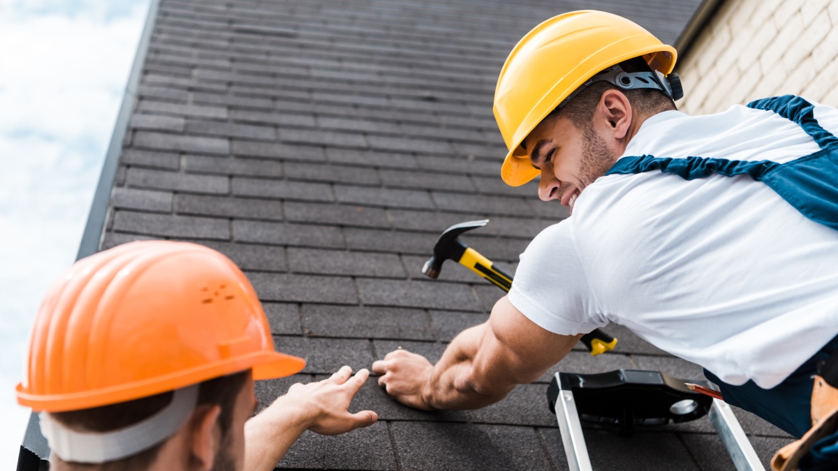 Wind-damaged roof covering on a Southwest Florida home
